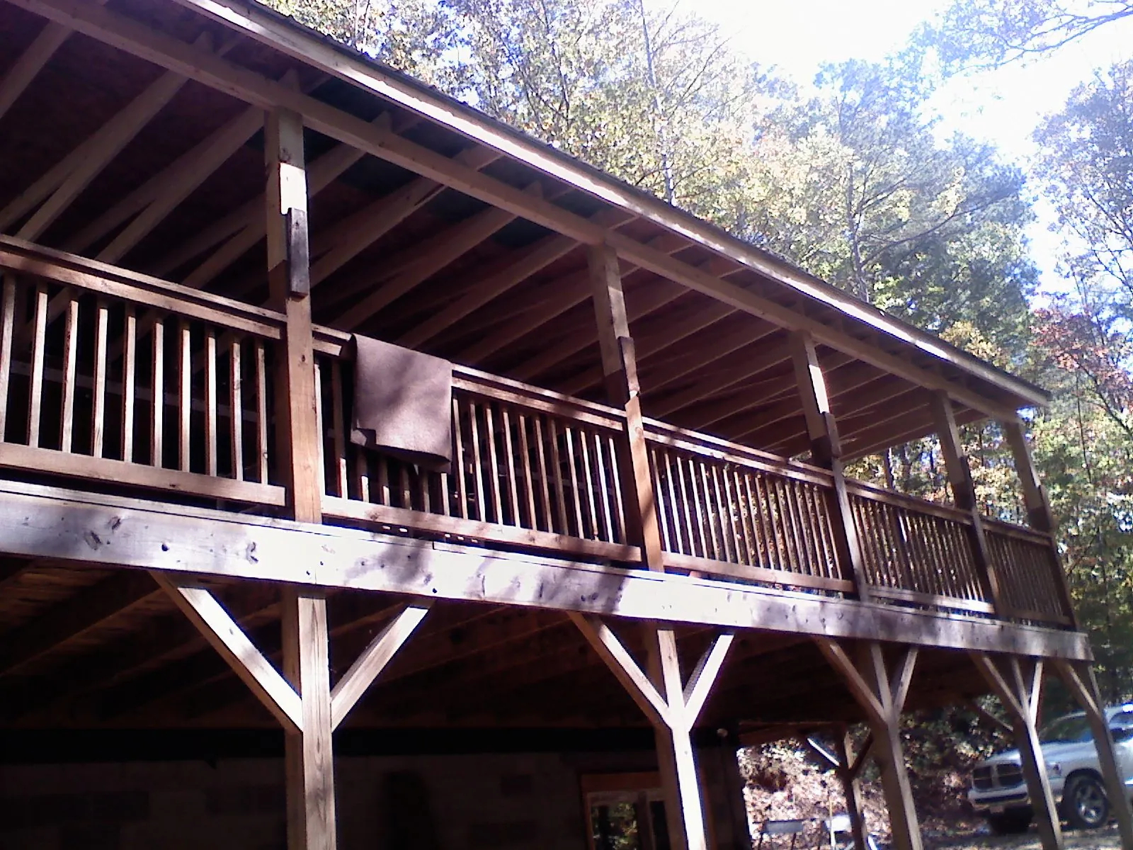 Timber framing under a new elevated porch and deck — Roof Leak Repair in Ida by Roofing Brothers